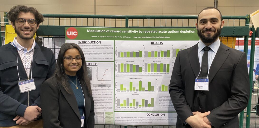 SM Patel, Y Alghafeer, and MJ Samara standing with their poster
