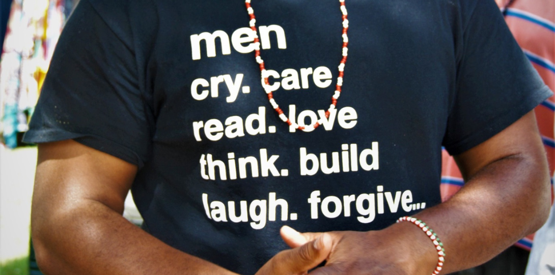 words on shirt promoting men and mental health